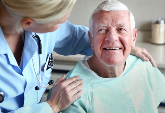 Doctor comforts patient.